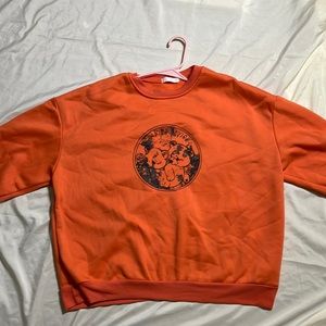Small, orange black, sweater